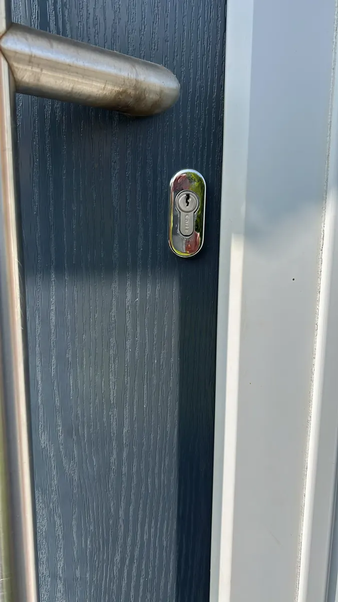 Composite door with a new cylinder fitted.